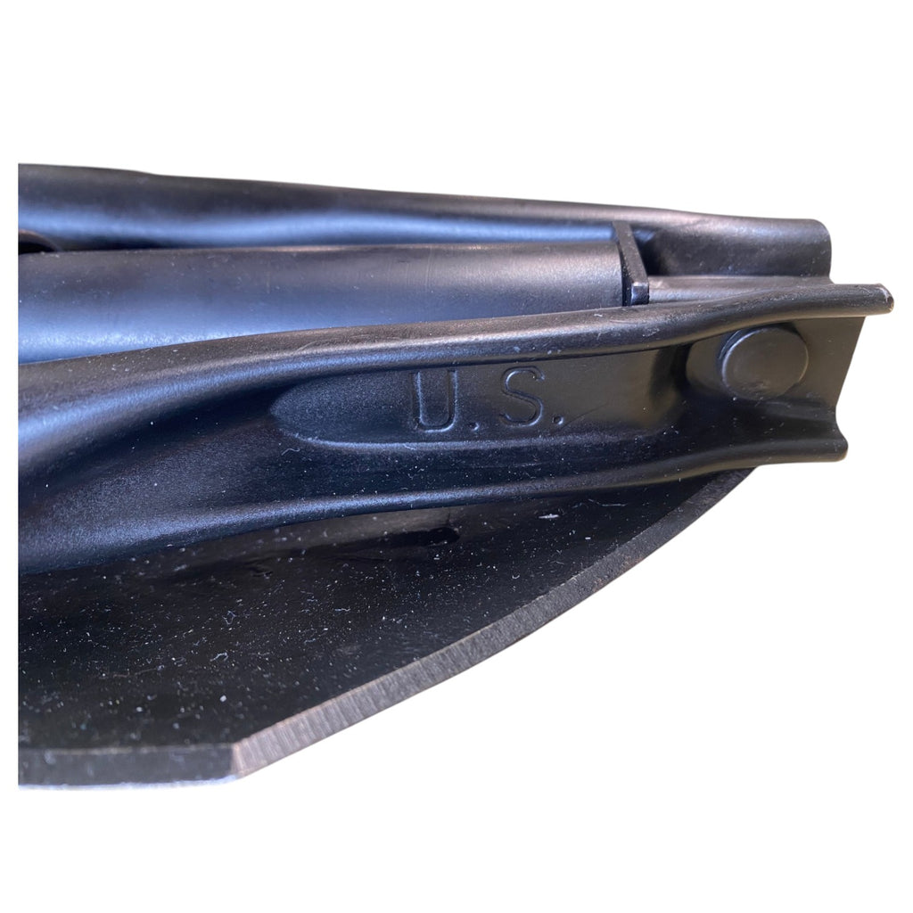 Pelle militaire pliante noire USA avec tige et jointure, détail gravé "U.S." sur la lame pliante.