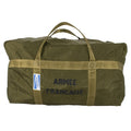 Sac de transport olive militaire avec bandoulière et inscription “ARMÉE FRANCAISE” sur le coton, poignée robuste.